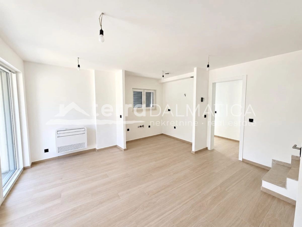 Maisonette-Wohnung in der Murterstraße – Neubau, Garten und Terrassen