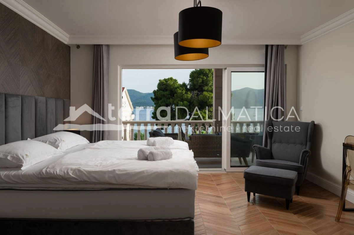 Renovirana povijesna vila u Vignju – prvi red do mora, grijani bazen i jacuzzi