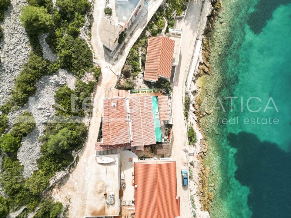 Žirje, house first row by the sea