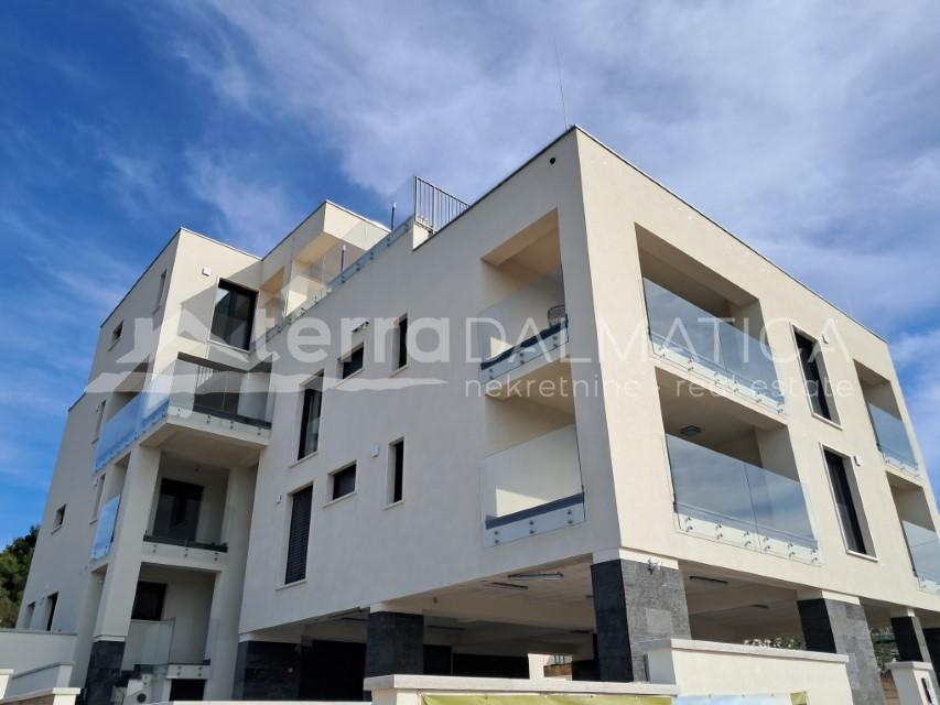 New development in Jezera with sea view, terrace, and parking space